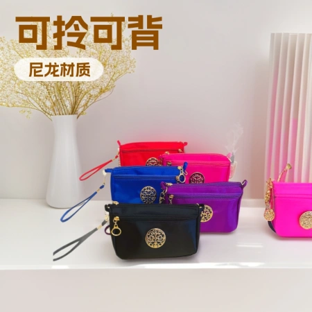 The new style is a hand-held bag that can be carried or carried, a single-shoulder crossbody bag, a small storage cosmetic bag, and a fashionable small phone bag The new style is a hand-held bag that can be carried or carried, a single-shoulder crossbody bag, a small storage cosmetic bag, and a fashionable small phone bag